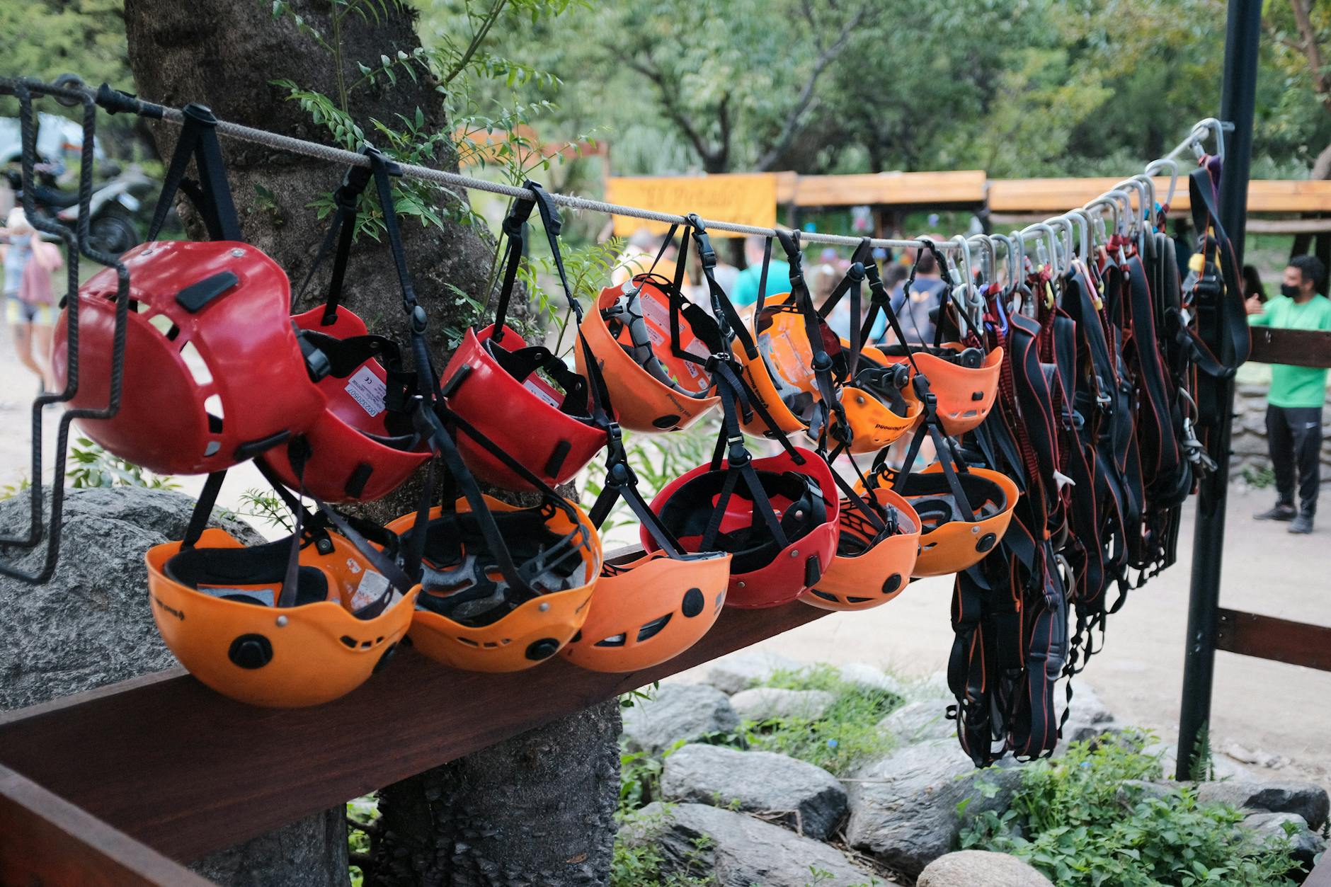 Hanging colorful helmets for climbing adventures in Merlo, Argentina.