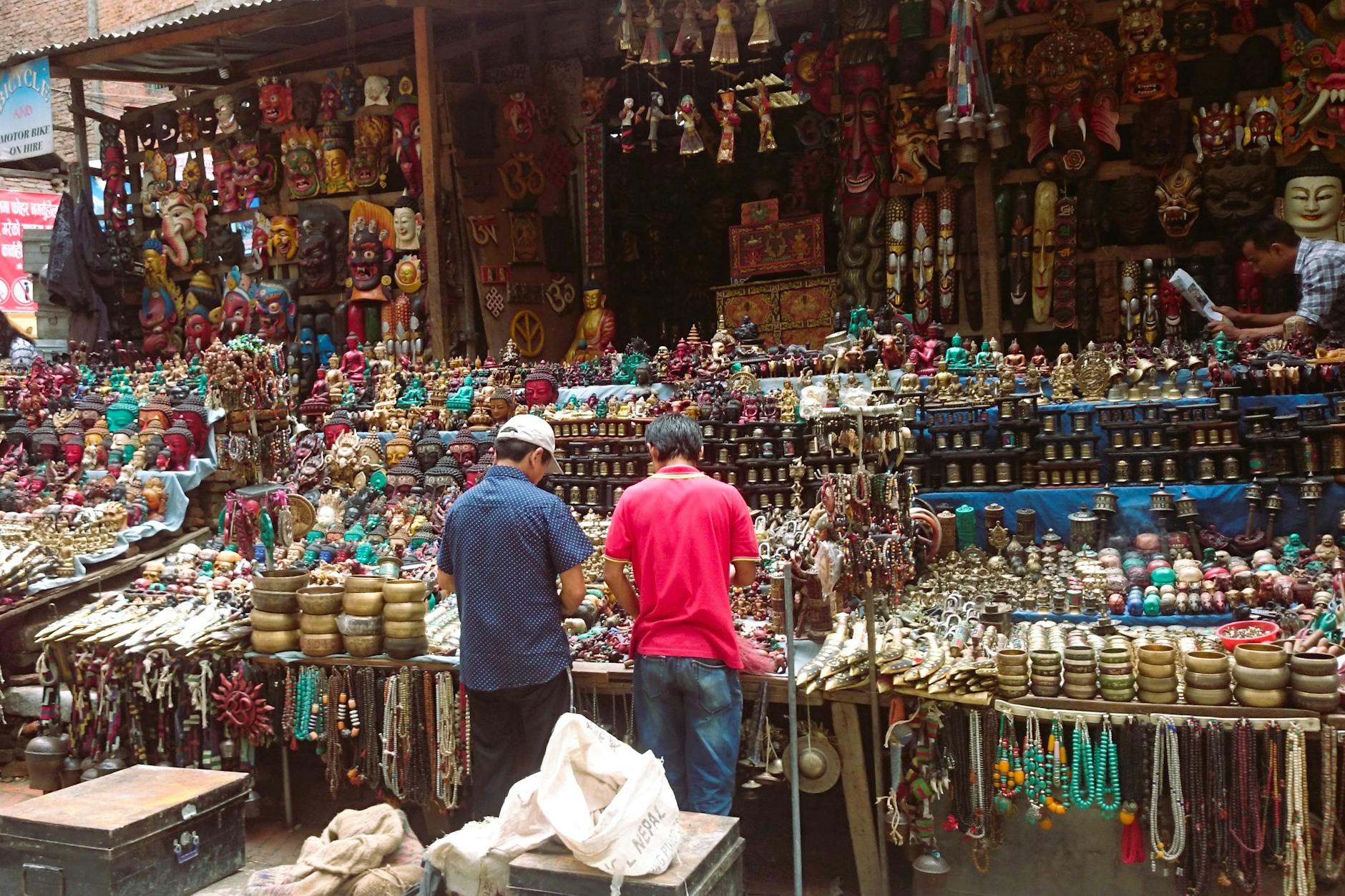 A vibrant display of traditional souvenirs in Thamel market, Kathmandu, Nepal.