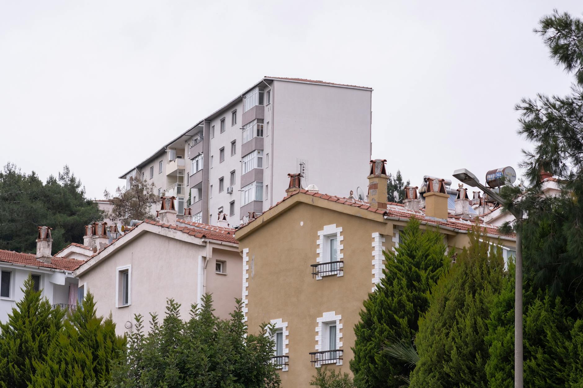 Charming residential area in Bornova, İzmir, showcasing urban architecture and greenery.