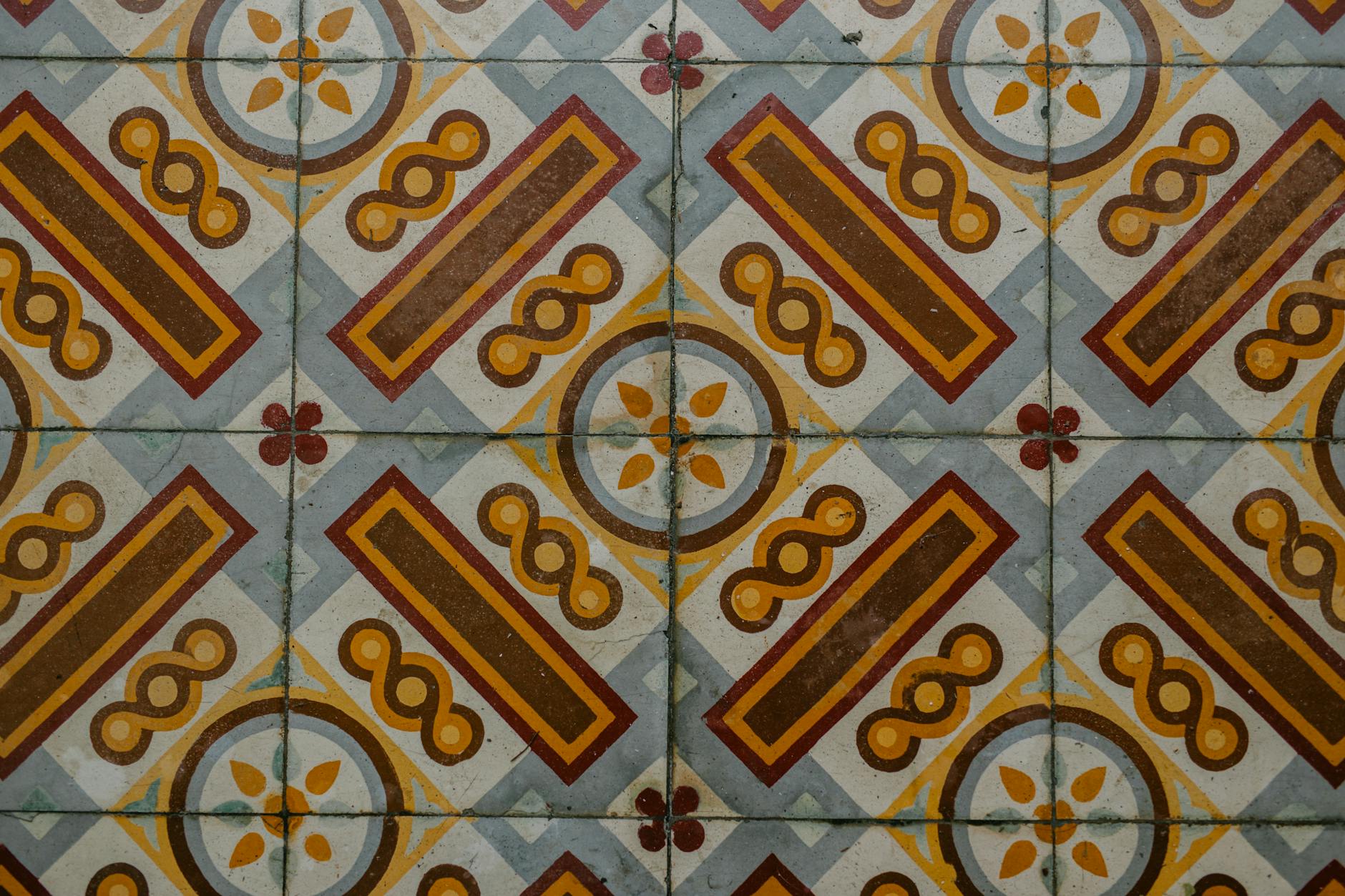 Detailed close-up of colorful geometric mosaic tiles with vibrant patterns.