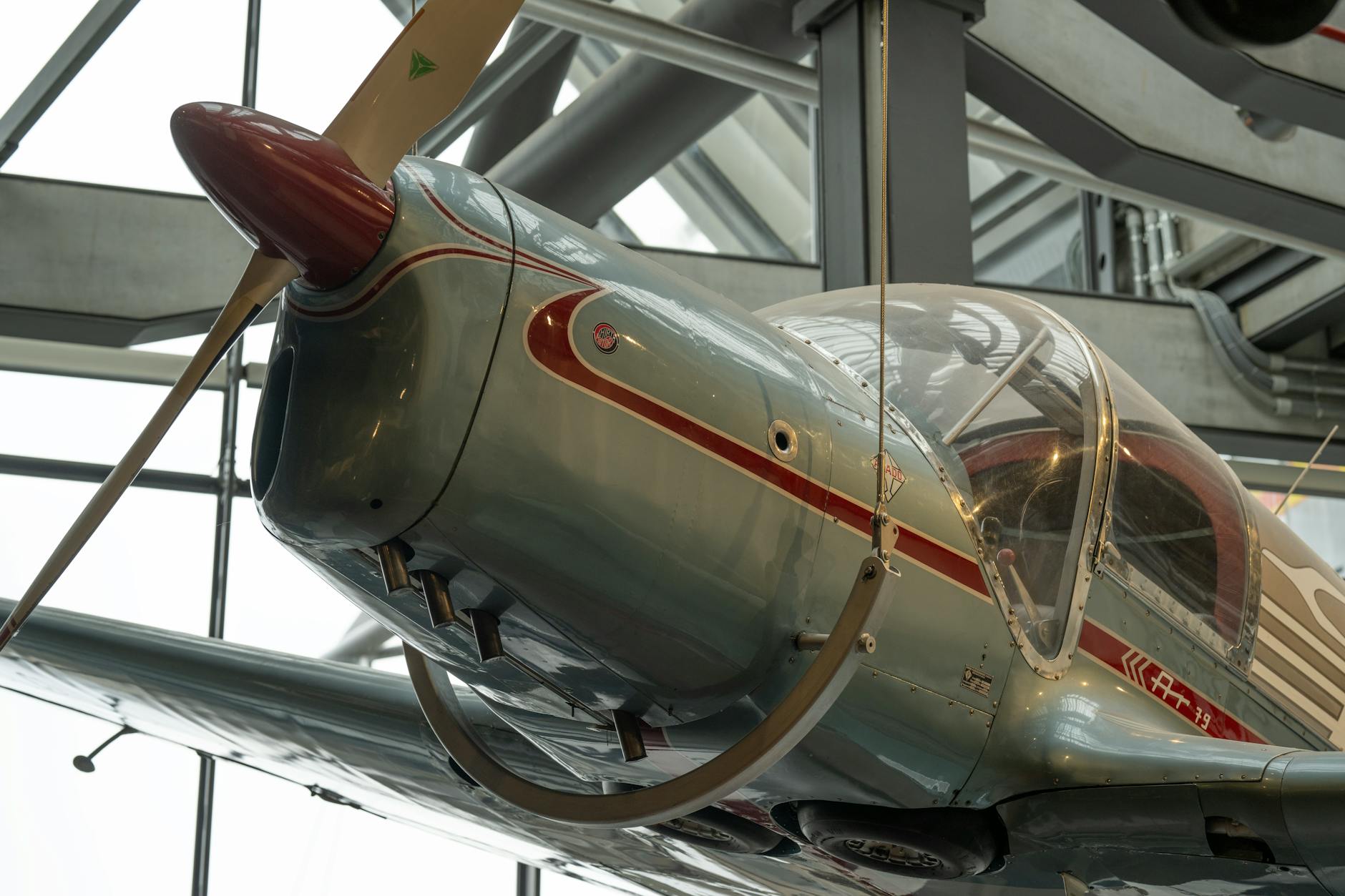 Detailed close-up of an Arado Ar 79 aircraft cockpit in a museum exhibit.