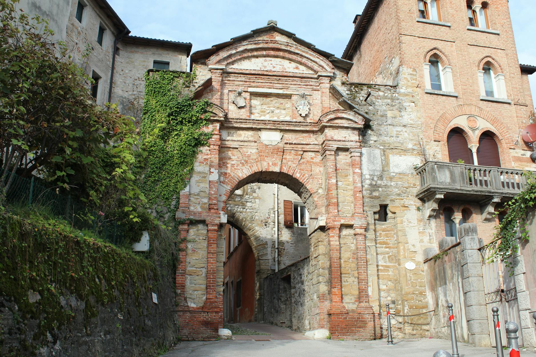 Explore the ancient stone architecture of Belluno with this historic gateway in Italy.