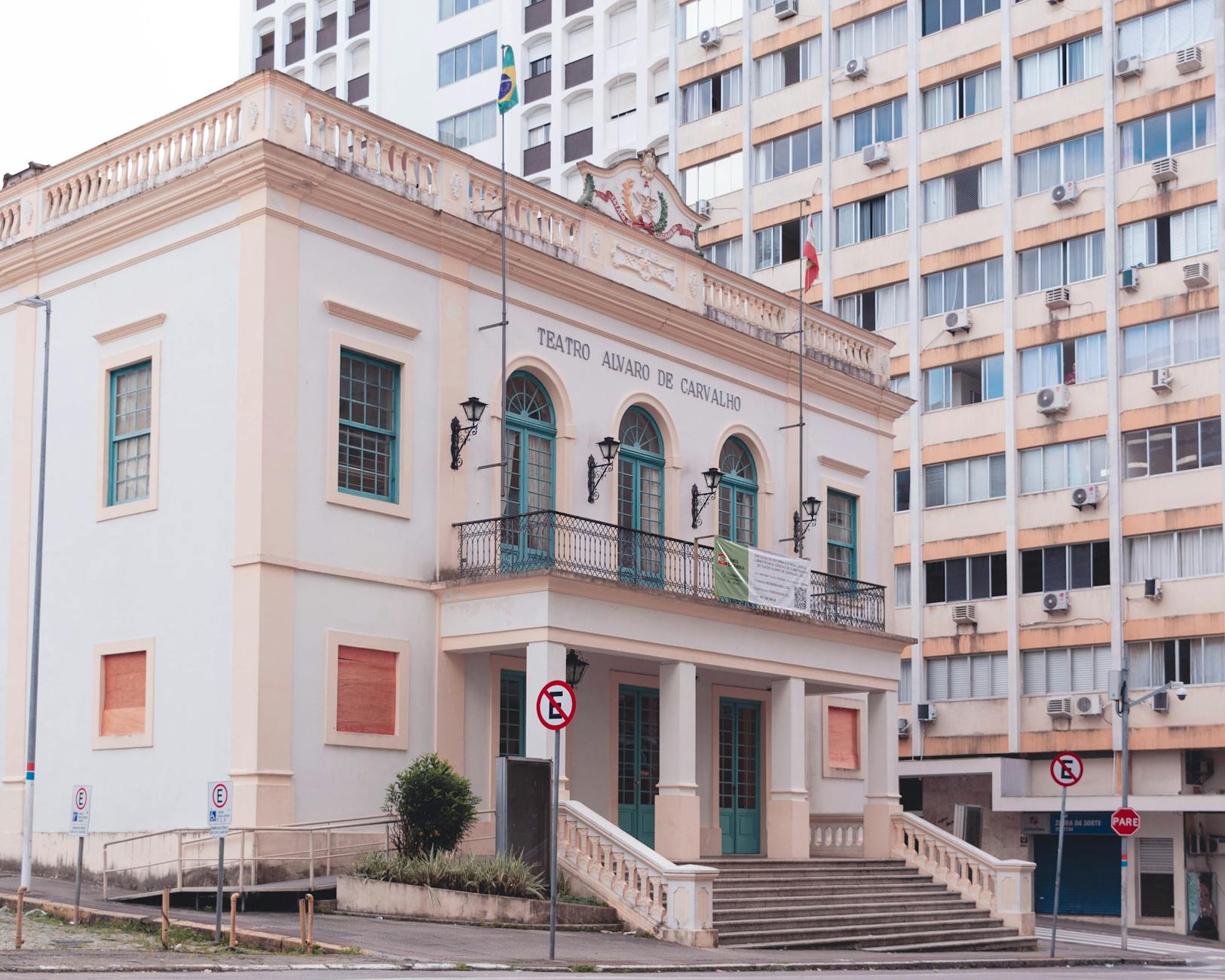 Historic Teatro Álvaro de Carvalho with urban backdrop in Florianópolis, Brazil.
