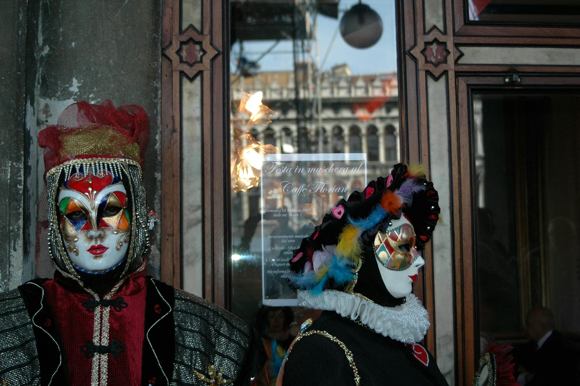 Vibrant Venetian masks adorn participants at a traditional festival, capturing cultural essence.